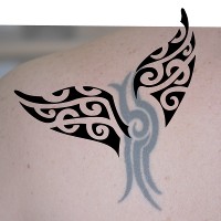 Whale tail tattoo photo