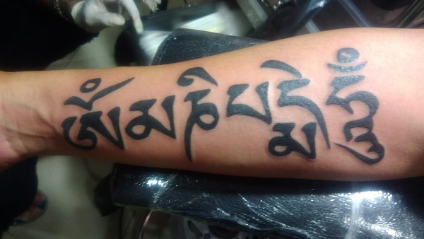 Agus - Tibetan Om Mani Padme Hum tattoo photo