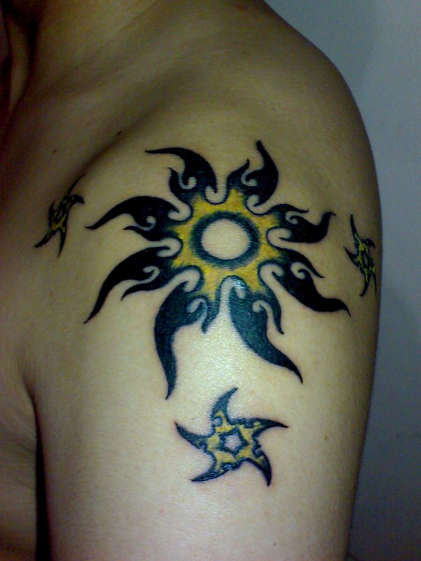 James - Sun and stars tattoo photo