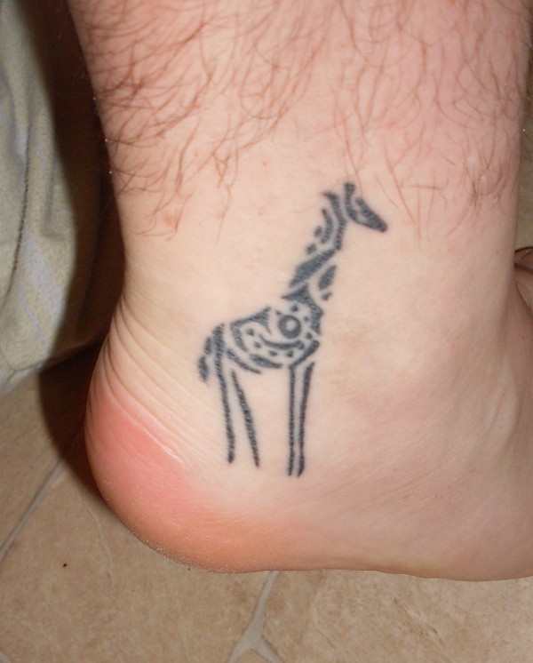 Derrick - Giraffe tattoo