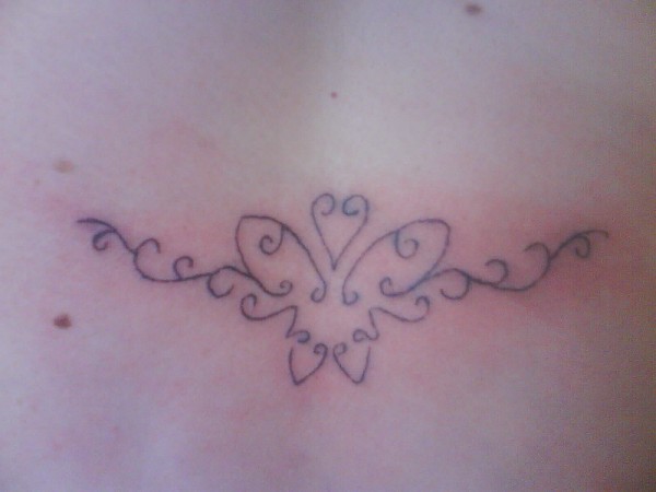 Yvonne - Butterfly lowerback tattoo photo