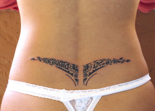 Elizabeth - Vegan lowerback tattoo photo