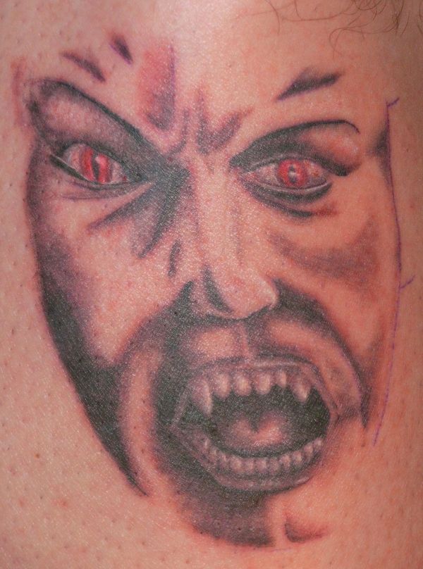 Evil Zone - Demon's face tattoo photo