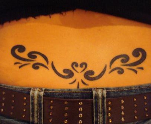 Gabi - Koru lowerback tattoo