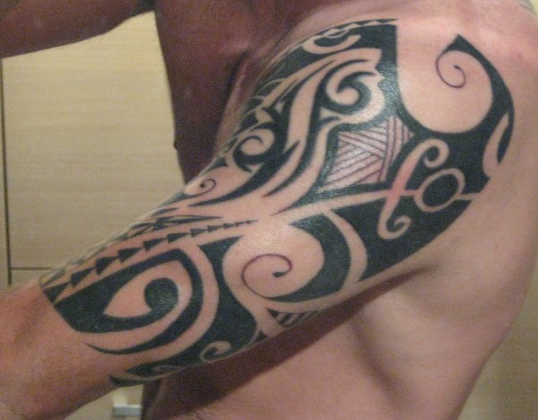 James - Polynesian arn outside tattoo