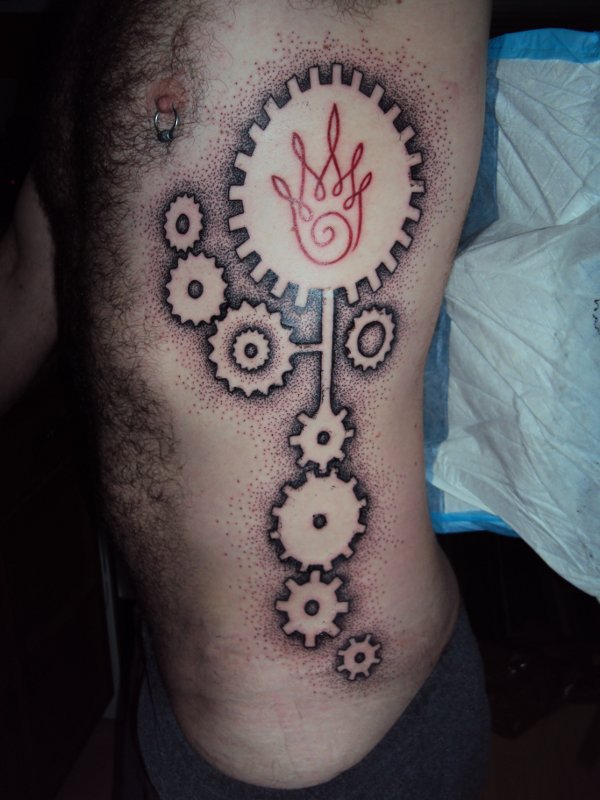 Jesse - Fire & gears tattoo