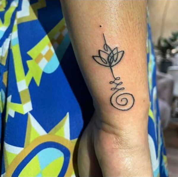 Joana - lotus unalome tattoo