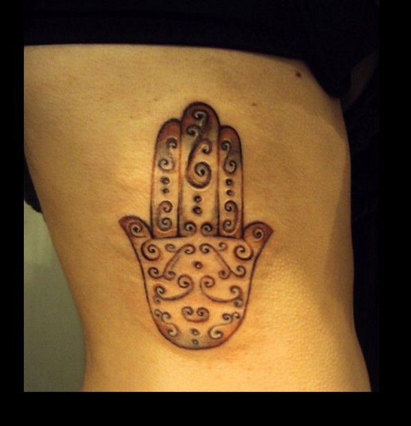 Melania - Hamsa tattoo photo