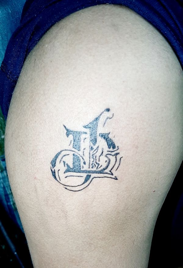 Pe - Woven letters tattoo photo