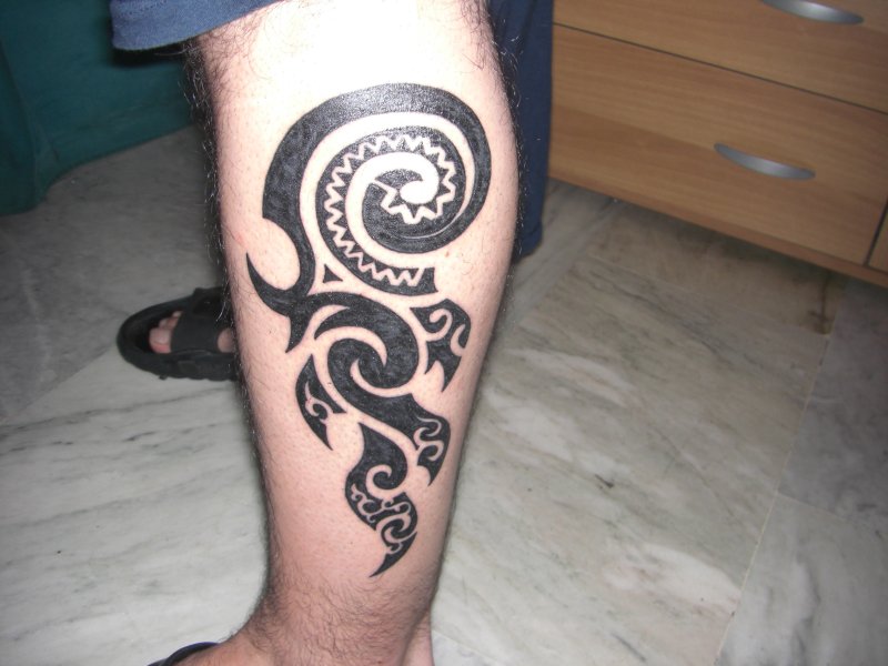 Riccardo - Koru e fuoco tattoo photo