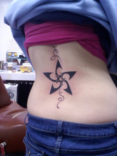 Saswa - Flower star tattoo photo