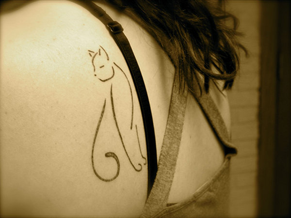 Snoopy - Stylized cat tattoo