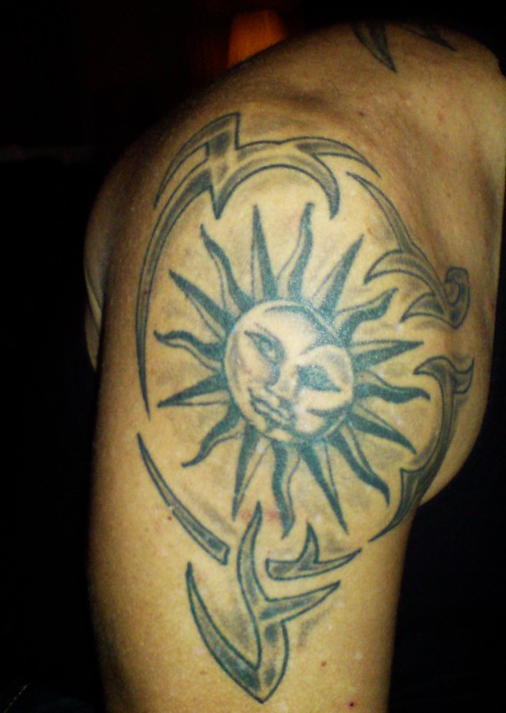 Stian - Tribal sun tattoo photo