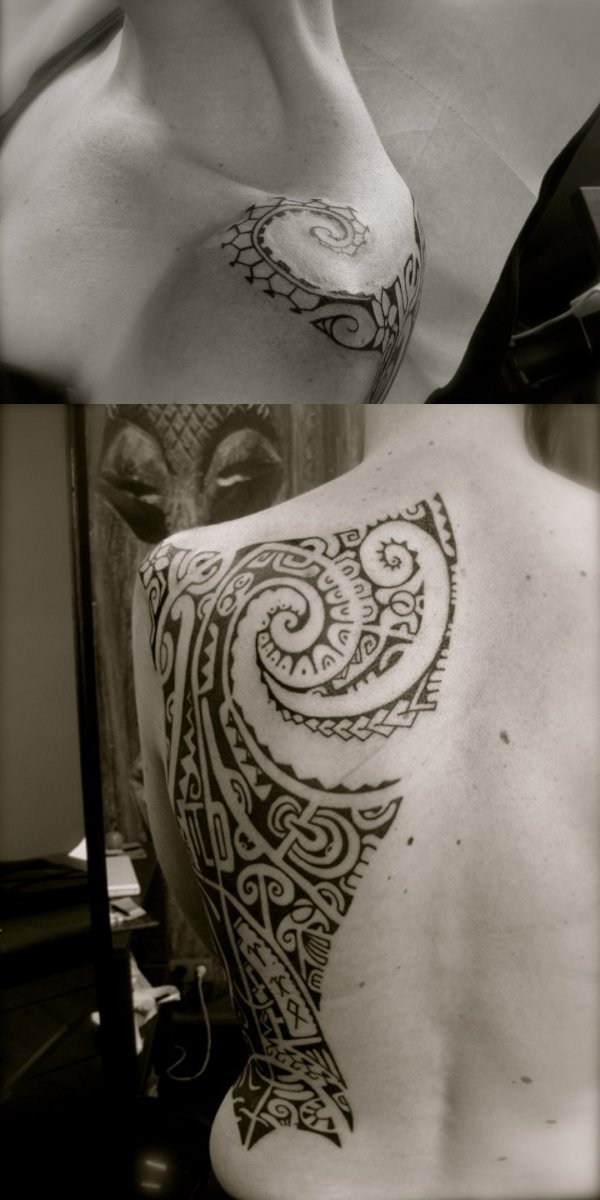 Tanne - Woman back tattoo photo