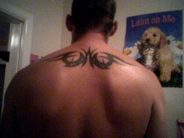 Zac - Tribal wings tattoo